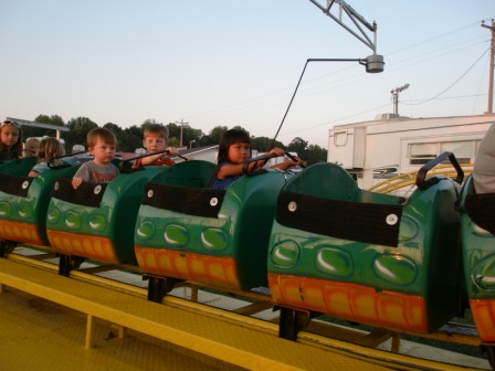 Kasen riding the Roller Coaster